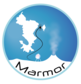 Logo du projet MARMOR, cercle plein bleu avec au centre l'ile de Mayotte en blanc et en bas du cercle un volcan est représenté en blanc et le nom du projet est inscrit dessus